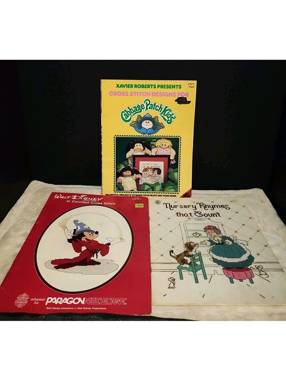 Cross Stitch Books  Lot Of 3. Walt Disney,  Cabbage Patch Dolls & Nursery Rhymes